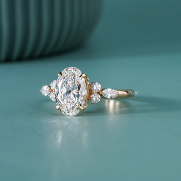 2ct oval with side stone round and marquise diamond
