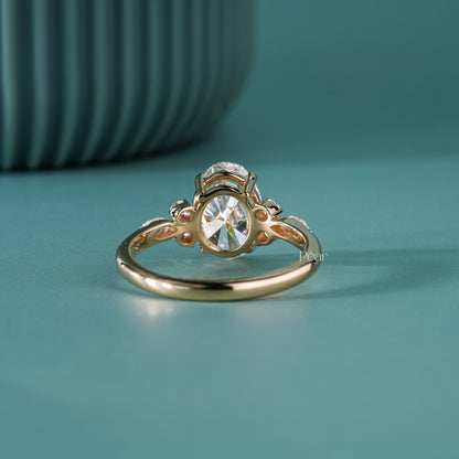2ct oval with side stone round and marquise diamond