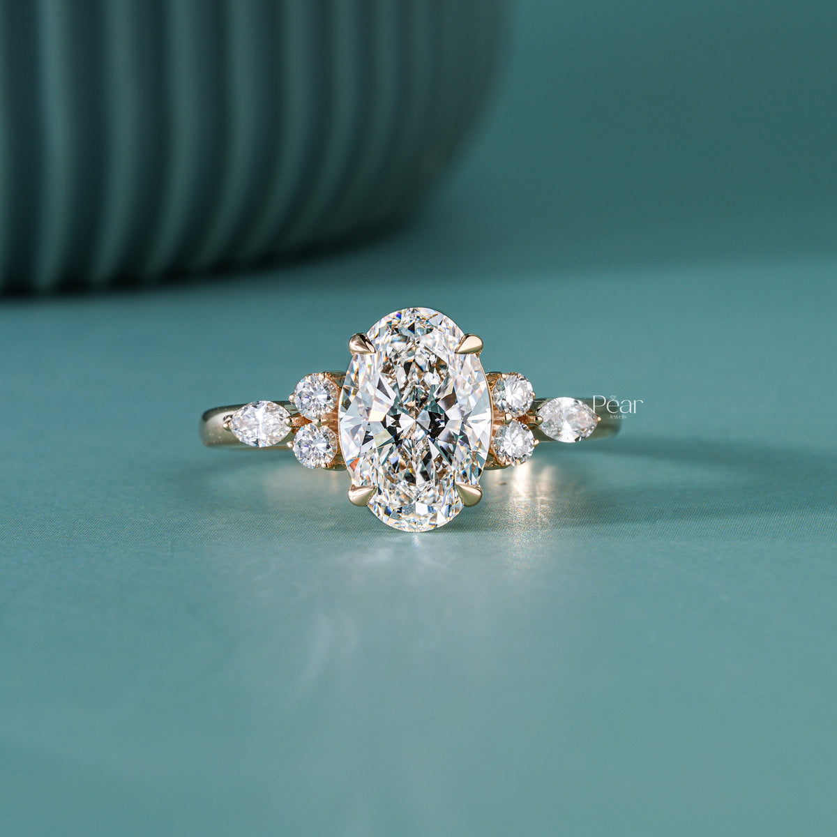 2ct oval with side stone round and marquise diamond