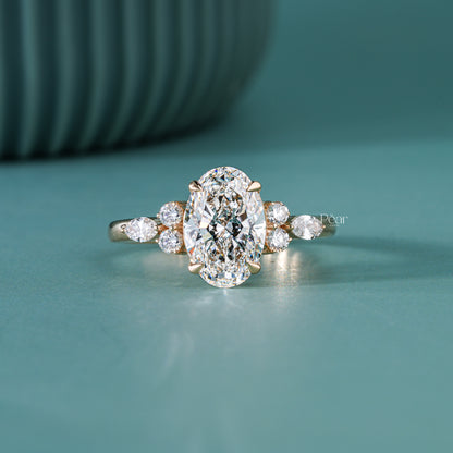 2ct oval with side stone round and marquise diamond