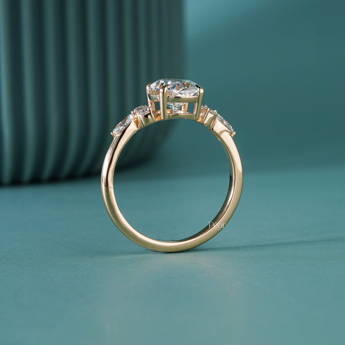 2ct oval with side stone round and marquise diamond